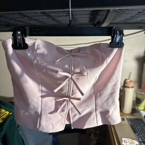 Elegant Pink Strapless Top with Bow Details